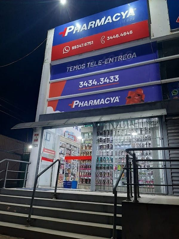 Fachada noturna da Pharmacya 40 em Viamópolis Viamão RS